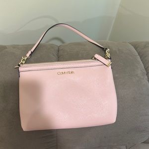 Pink Calvin Klein clutch bag